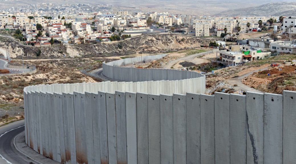 The Israeli separation wall divides the Pisgat Zeev Israeli Settlement, on the left, and the Shuafat Refugee Camp, on the right, outside Jerusalem,  January 25, 2011. Al-Jazeera released leaked documents called the "Palestine Papers" that reveal  that Palestinian negotiators were willing to compromise on the issues of Jerusalem and refugees during peace talks with Israel in 2008.  UPI/Debbie Hill